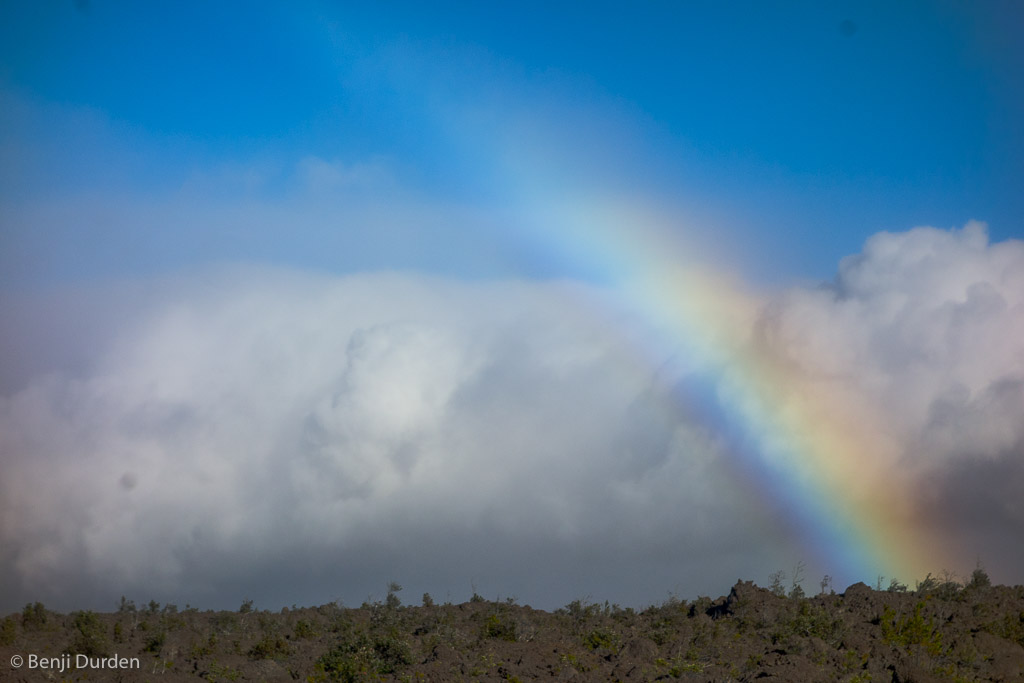 Rainbow over lava field
